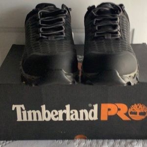 Timberland woman’s steel Toes shoes.